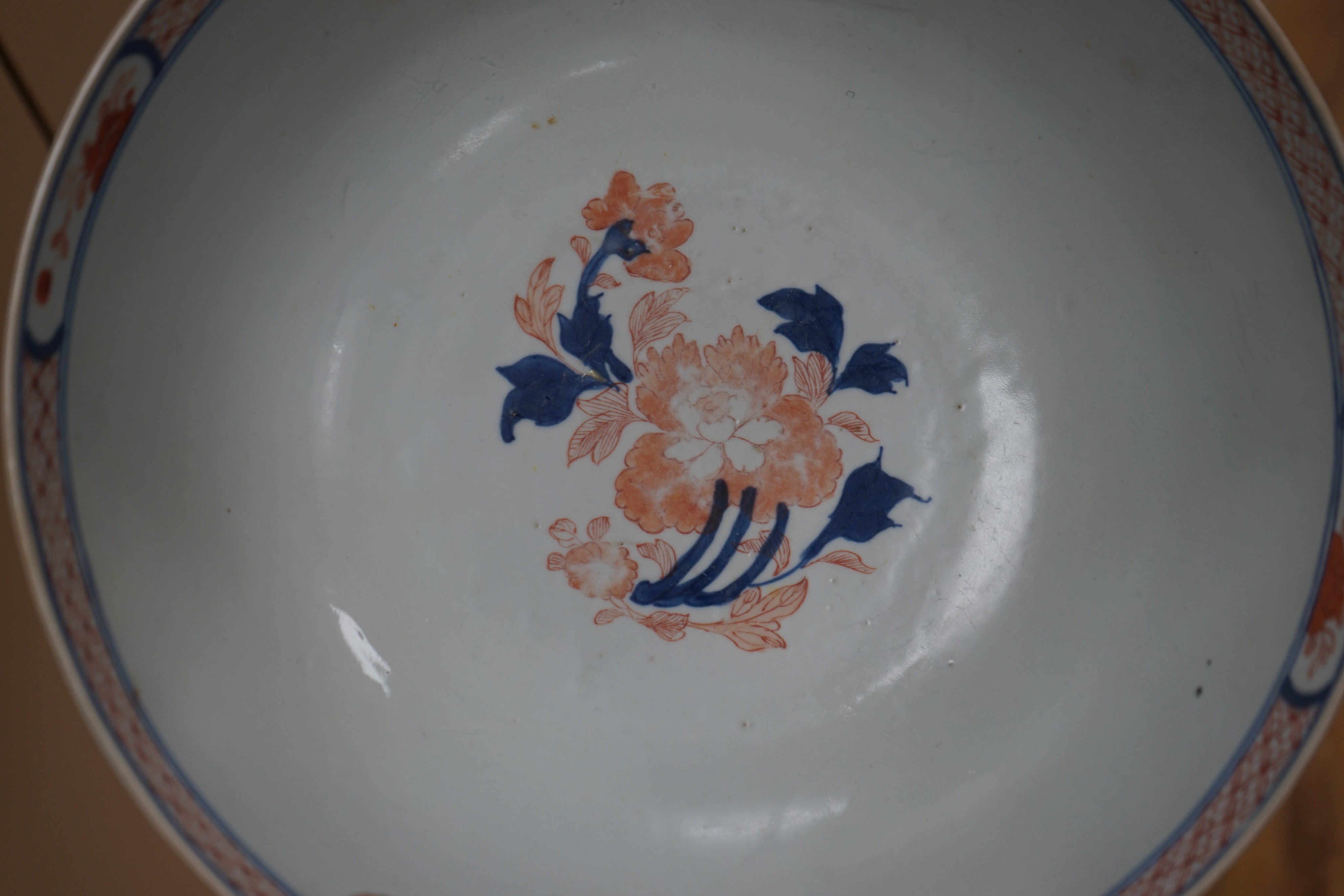 Three 18th century Chinese export porcelain bowls, largest 28 cm and two plates